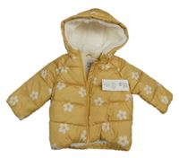 Nové - okrová prošívaná šusťáková zimní bunda s květy a kapucí F&F