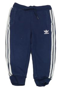 Tmavomodré tepláky s logem Adidas