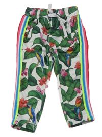 Bílé sportovní tepláky s listy, papoušky a barevnými pruhy