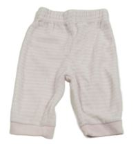 Ružovo-biele pruhované zamatové tepláky