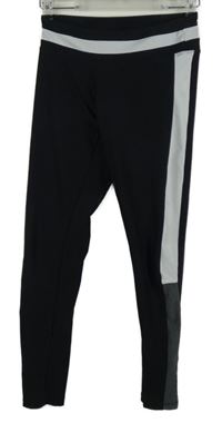 Dámské černo-bílé sportovní legíny s pruhy 