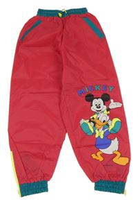 Tmavorůžovo-zelené šušťákové nepromokavé nohavice s Mickeym