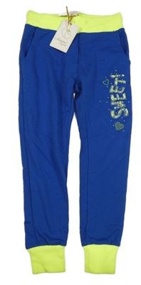 Nové - Tmavomodro-neonově žluté tepláky s nápisem