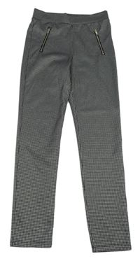 Čierno-biele kockované tregíny so zipy