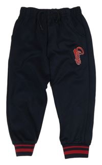 Tmavomodré sportovní tepláky s nápisem a pruhy