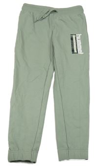 Zelenošedé tepláky s nápisem Hummel