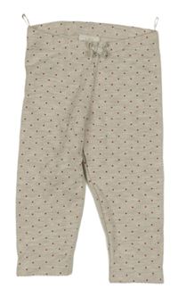 Světlebéžovošedé melírované puntíkaté teplákové legíny s mašlí C&A