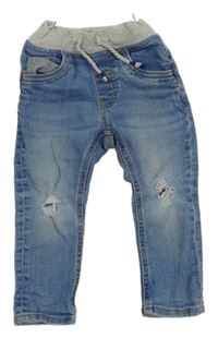 Modré rifle s úpletovým pasem a dírami na kolenou C&A