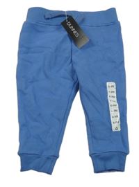 Nové - Modré tepláky se smajlíkem Dunnes