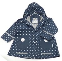 Tmavomodro-biela bodkovaná á vodeodolná jarná bunda s kapucňou