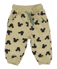 Béžové tepláky s Mickeym Disney