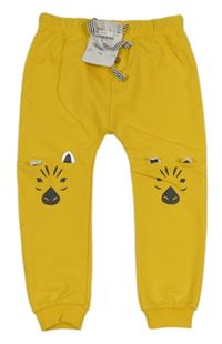 Nové - Žlté tepláky so zebrami Mayoral