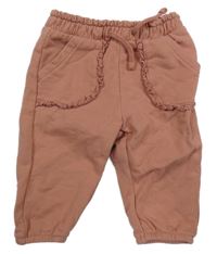 Starorůžové tepláky s volánky C&A