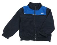 Tmavomodro-modrá šušťáková jarná bunda s logom Slazenger