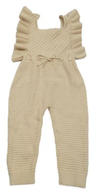 Béžový vzorovaný pletený overal s volánikmi