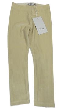 Nové - smetanové žebrované plyšové legíny name it.