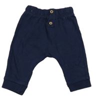 Tmavomodré tepláky s gombíkmi Nutmeg