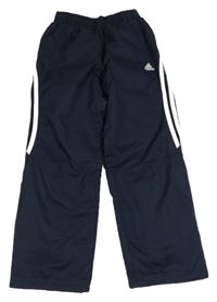 Tmavomodré šušťákové funkčné nohavice s logom Adidas