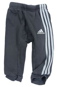 Sivé tepláky s logom Adidas