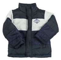 Tmavomodro-bílá šusťáková prošívaná zimní bunda s nášivkou 