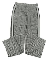 Čierno-biele vzorované tregíny s proužkem