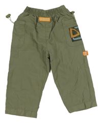 Khaki šušťákové podšité nohavice s vreckami