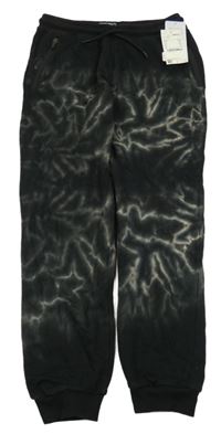 Nové - Čierno-sivé batikované tepláky C&A