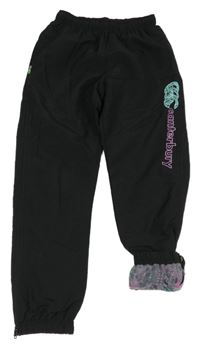 Čierne šušťákové podšité nohavice s logom Canterbury