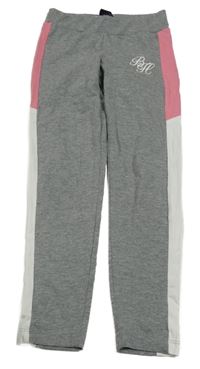 Sivé legíny s bielým pruhom a nápisom