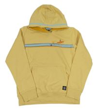 Žltá mikina s vlnami a dívkou a kapucňou