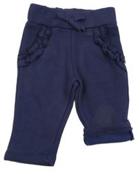 Tmavomodré tepláky s volánky 