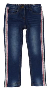 Tmavomodré skinny rifle s trblietavymi pruhmi