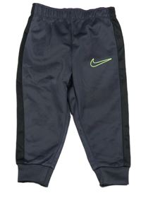 Tmavošedo-černé sportovní tepláky Nike