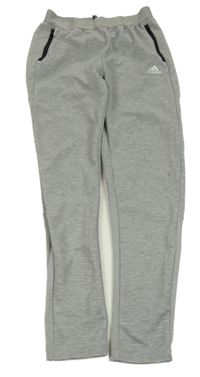 Sivé melírované športové nohavice s logom Adidas vel. 16 let