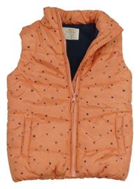 Oranžová melírovaná puntíkatá šusťáková zateplená vesta