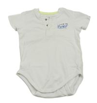 Bílé body s nápisem 