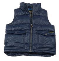 Tmavomodrá šušťáková zateplená vesta s vreckami