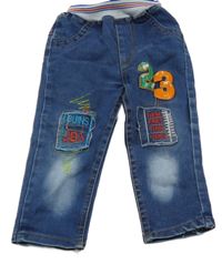 Modré rifle s nášivkami a úpletovým pasom