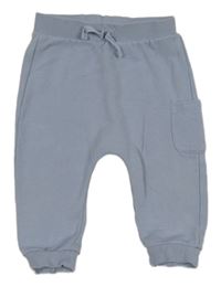 Svetlomodré tepláky s vreckom Tu