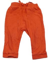 Červené tepláky Tu