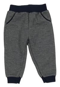 Tmavomodro-bílé vzorované tepláky 