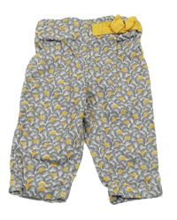 Bielo-tmavomodro-okrové vzorované voľné é nohavice s mašlou Obaibi