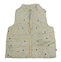 Smotanová prešívaná šušťáková zateplená vesta s farebnými srdiečkami GAP