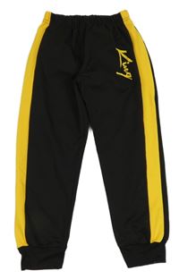 Čierno-horčicové tepláky s nápisom