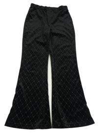 Čierne zamatové flare kárované nohavice Primark