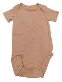 Pudrové body H&M