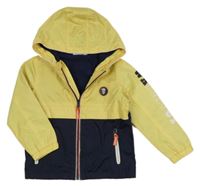 Žluto-tmavomodrá šusťáková lehce zateplená bunda s nášivkou a kapucí Kids