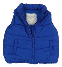 Modrá šušťáková zateplená vesta Mothercare