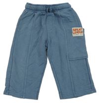 Modrošedé tepláky s vreckom s nášivkou Zara