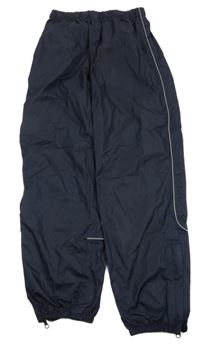 Tmavomodré šusťákové kalhoty 